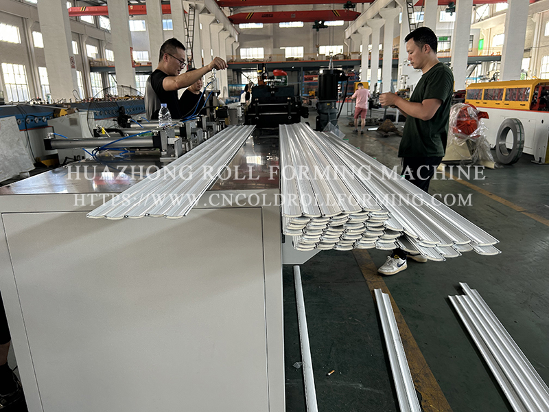 Roller shutter forming machine