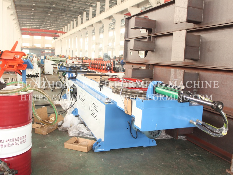 Bending machine for garage door