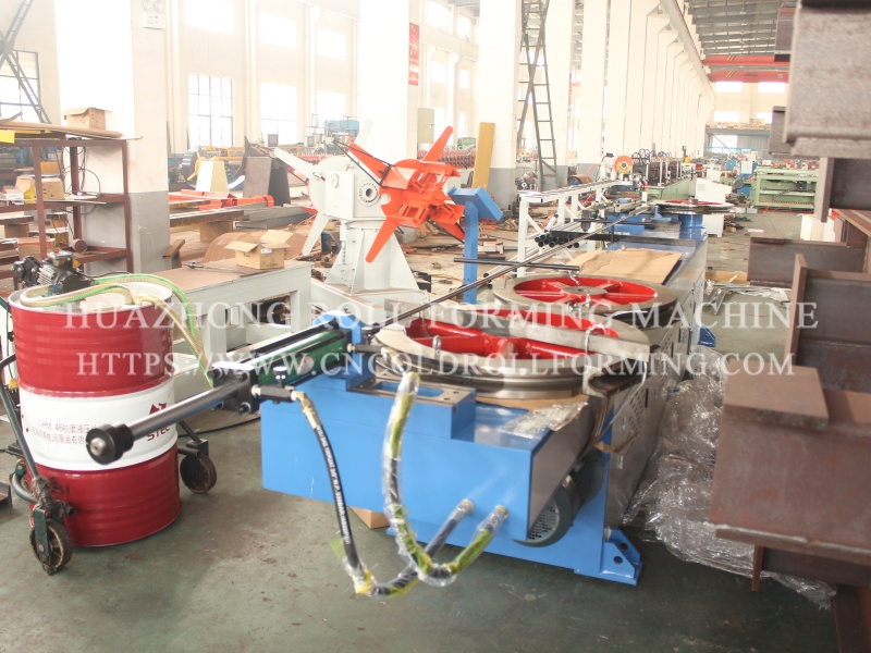 Bending machine for garage door