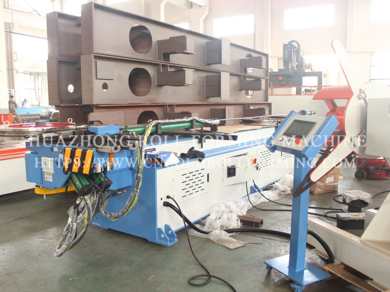 Bending machine for garage door