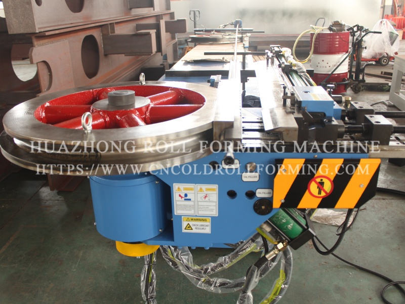 Bending machine for garage door