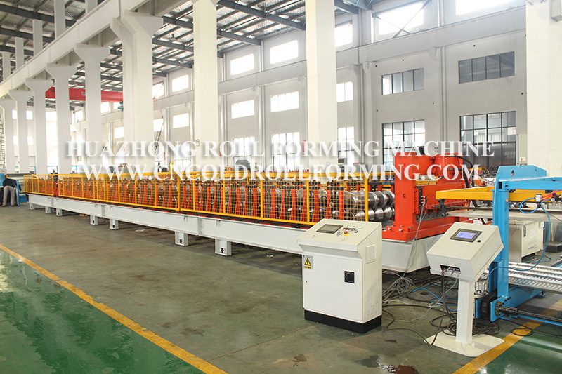 Metal cladding forming machine